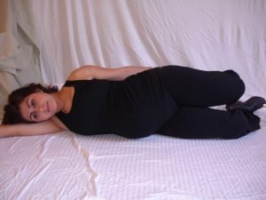 Side-lying quad stretch